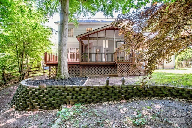 292 Rose St, Mooresville, NC 28117 - rear view of house with a sunroom, a fenced backyard, a wooden deck, and stairs