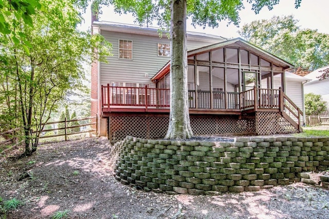 292 Rose St, Mooresville, NC 28117 - back of property with a sunroom, fence, and a wooden deck