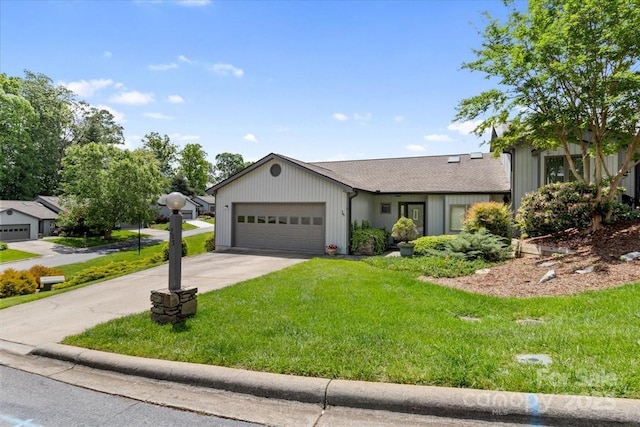 305 Kyfields, Weaverville, NC 28787 - view of front of home with a front yard, an attached garage, and driveway