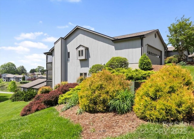 305 Kyfields, Weaverville, NC 28787 - view of side of property with a garage and a yard