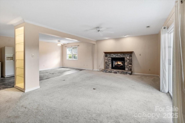305 Kyfields, Weaverville, NC 28787 - unfurnished living room featuring carpet, ceiling fan, baseboards, a fireplace, and crown molding