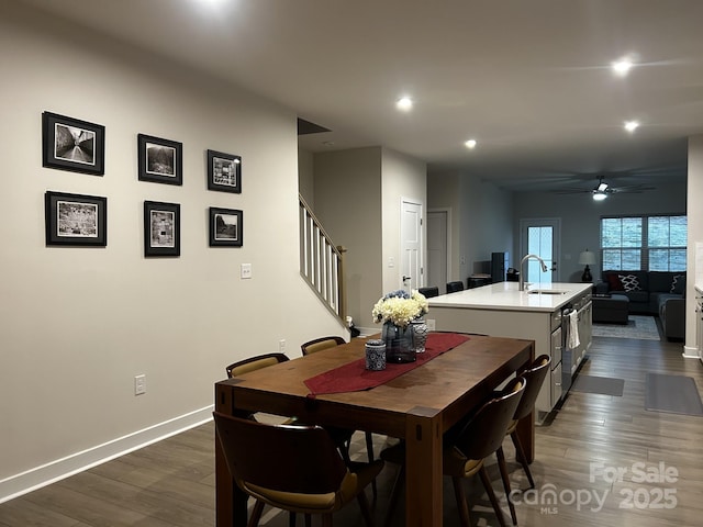 934 Prince Garrett Way, Denver, NC 28037 - dining area featuring stairway, recessed lighting, ceiling fan, dark wood finished floors, and baseboards