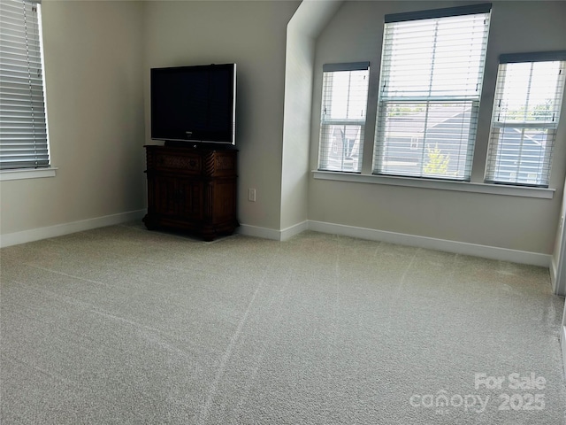 934 Prince Garrett Way, Denver, NC 28037 - unfurnished living room with healthy amount of natural light, baseboards, and carpet