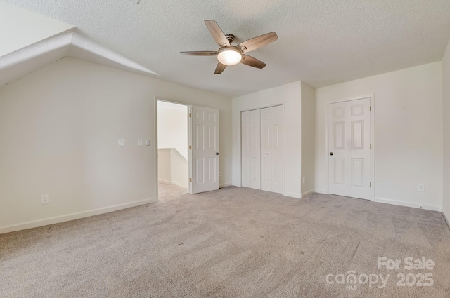 5108 Tedorill Ln, Charlotte, NC 28226 - unfurnished bedroom with a textured ceiling, carpet, baseboards, and a closet