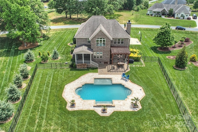 4941 Campobello Dr, Monroe, NC 28110 - back of property with a chimney, a patio, a balcony, and brick siding