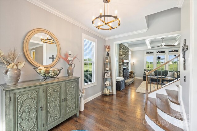 4941 Campobello Dr, Monroe, NC 28110 - foyer entrance with a chandelier, ornamental molding, baseboards, dark wood finished floors, and ceiling fan