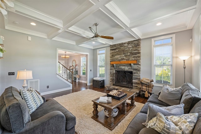 4941 Campobello Dr, Monroe, NC 28110 - living area with healthy amount of natural light, stairway, dark wood finished floors, ornamental molding, and ceiling fan