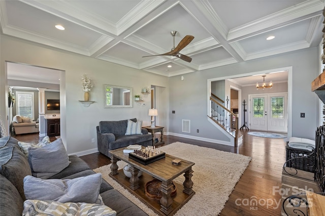 4941 Campobello Dr, Monroe, NC 28110 - living area with stairway, french doors, crown molding, dark wood finished floors, and beamed ceiling
