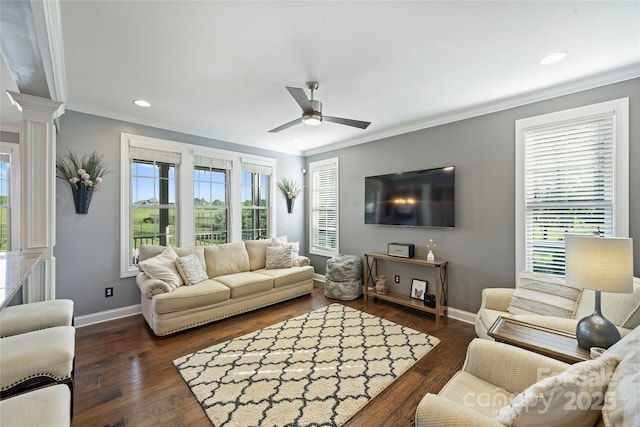 4941 Campobello Dr, Monroe, NC 28110 - living area with decorative columns, ornamental molding, baseboards, ceiling fan, and wood finished floors