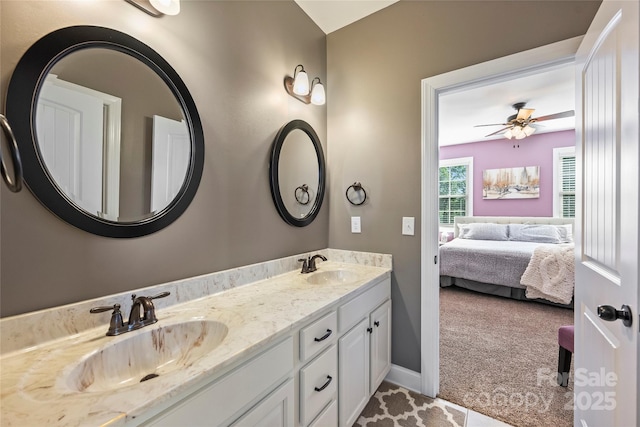 4941 Campobello Dr, Monroe, NC 28110 - bathroom featuring connected bathroom, double vanity, a ceiling fan, and baseboards