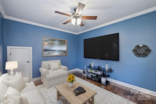 4941 Campobello Dr, Monroe, NC 28110 - living room with wood finished floors, a ceiling fan, baseboards, and crown molding