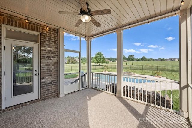 4941 Campobello Dr, Monroe, NC 28110 - unfurnished sunroom with ceiling fan and a rural view