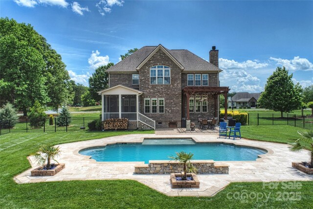4941 Campobello Dr, Monroe, NC 28110 - back of house with a sunroom, a chimney, a pergola, brick siding, and a patio