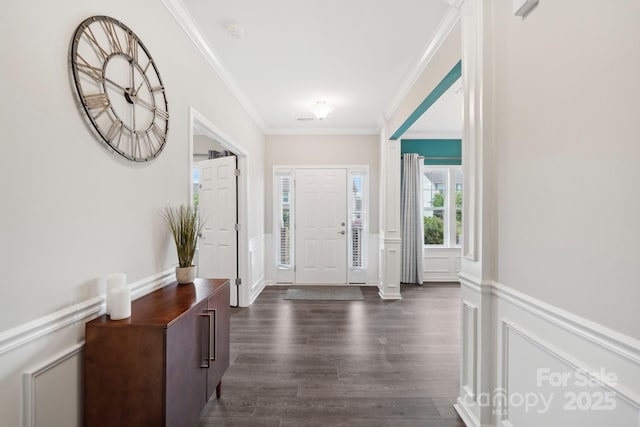 3218 Gilroy Dr, Fort Mill, SC 29707 - foyer entrance featuring ornamental molding, a decorative wall, dark wood finished floors, and a wainscoted wall