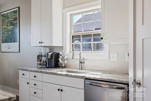 19 Wetland Way, Arden, NC 28704 - kitchen with dishwasher, a sink, white cabinets, and light stone counters