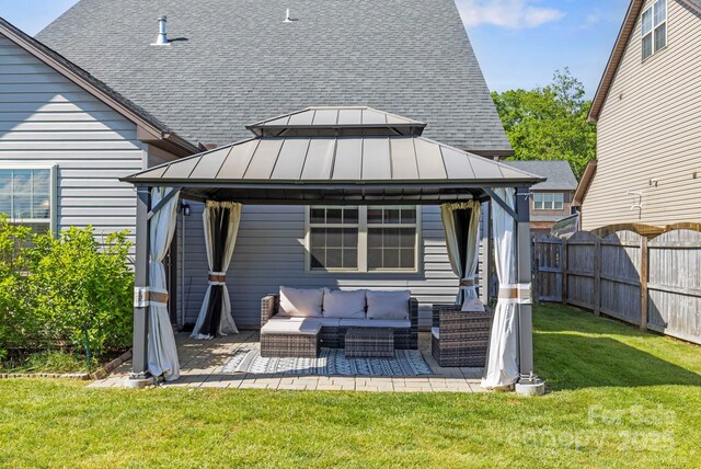 19 Wetland Way, Arden, NC 28704 - rear view of house featuring a gazebo, an outdoor living space, a standing seam roof, and roof with shingles