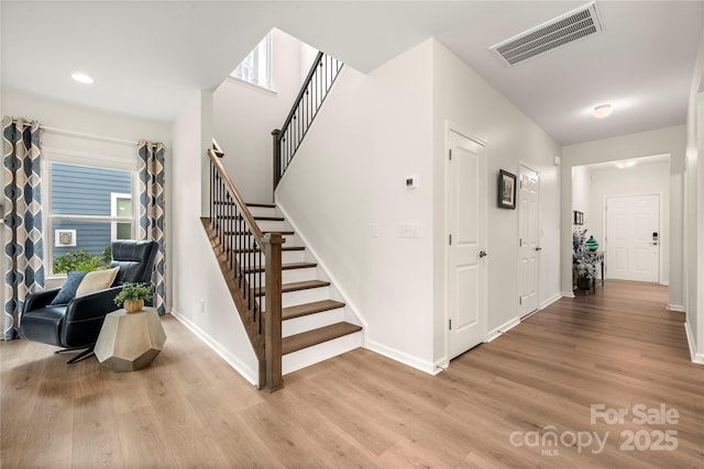 1918 Thoreau Way, York, SC 29745 - staircase featuring wood finished floors and baseboards