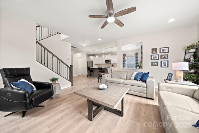 1918 Thoreau Way, York, SC 29745 - living area featuring light wood-type flooring, stairway, a ceiling fan, baseboards, and recessed lighting