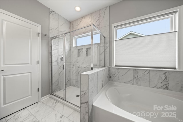 1918 Thoreau Way, York, SC 29745 - bathroom featuring marble look tiles, a garden tub, a marble finish shower, and recessed lighting