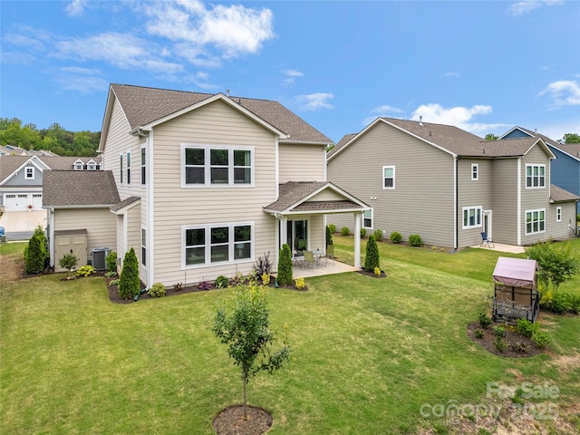 1918 Thoreau Way, York, SC 29745 - back of house featuring cooling unit, a patio, and a lawn