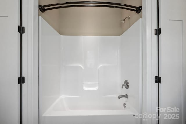 full bath featuring bathtub / shower combination