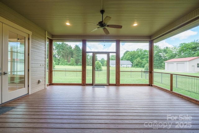 unfurnished sunroom featuring plenty of natural light