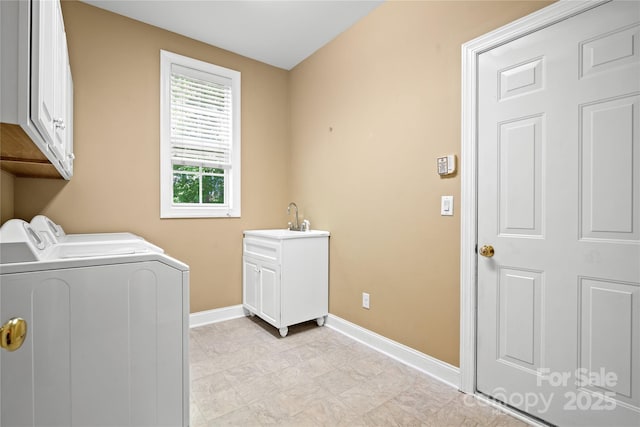 10616 Back Ridge Rd, Charlotte, NC 28277 - washroom featuring washing machine and clothes dryer, cabinet space, and baseboards
