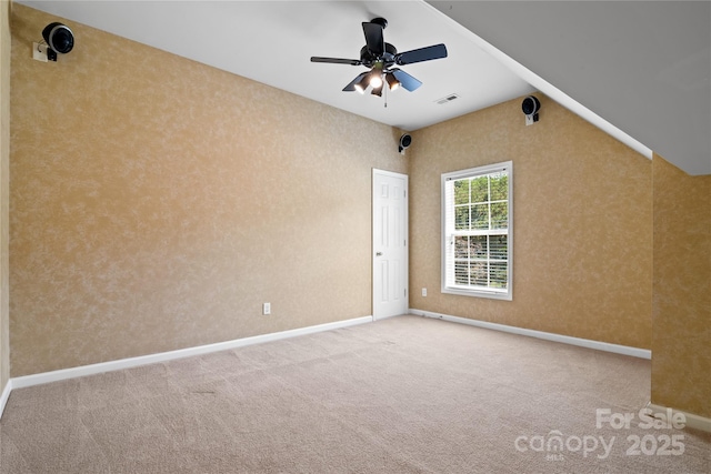 10616 Back Ridge Rd, Charlotte, NC 28277 - carpeted empty room with baseboards, a ceiling fan, and vaulted ceiling