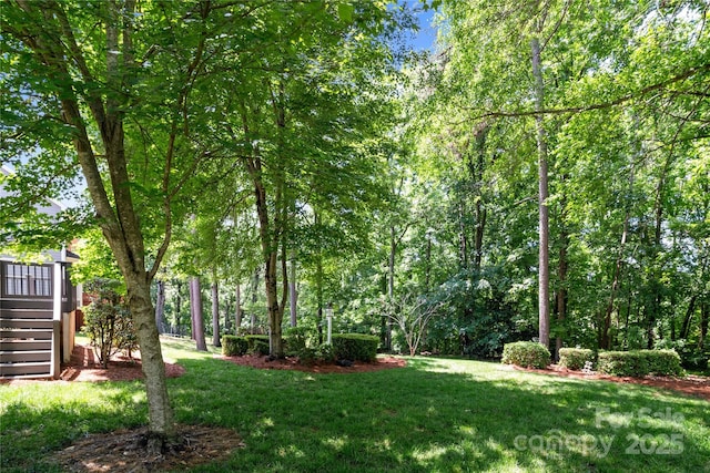 10616 Back Ridge Rd, Charlotte, NC 28277 - view of grassy yard featuring stairway and a wooden deck