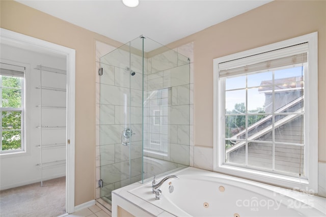 10616 Back Ridge Rd, Charlotte, NC 28277 - full bathroom with a shower stall, healthy amount of natural light, a whirlpool tub, and baseboards