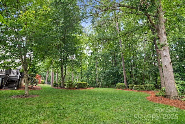 10616 Back Ridge Rd, Charlotte, NC 28277 - view of green lawn with a wooden deck and stairs