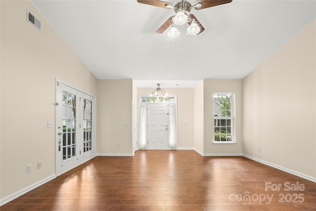9430 Duckhorn Dr, Charlotte, NC 28277 - unfurnished living room with hardwood / wood-style flooring, a chandelier, and ceiling fan