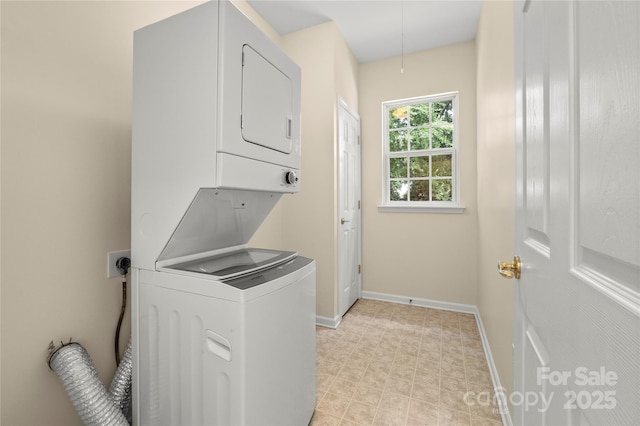 9430 Duckhorn Dr, Charlotte, NC 28277 - washroom featuring estacked washer and dryer and attic access