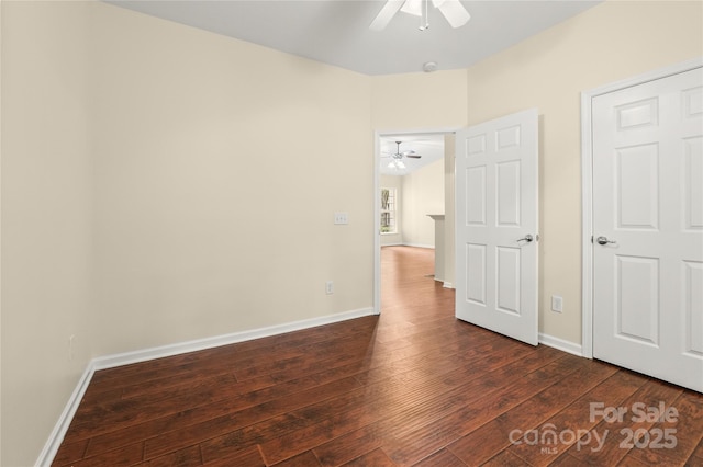 9430 Duckhorn Dr, Charlotte, NC 28277 - unfurnished bedroom with dark wood-type flooring and a ceiling fan