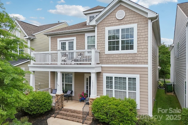 10401 Royal Winchester Dr, Charlotte, NC 28277 - view of front facade with covered porch, central AC, and roof with shingles