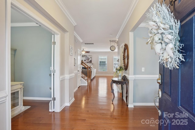 10401 Royal Winchester Dr, Charlotte, NC 28277 - foyer entrance with wood finished floors, crown molding, stairway, baseboards, and a ceiling fan