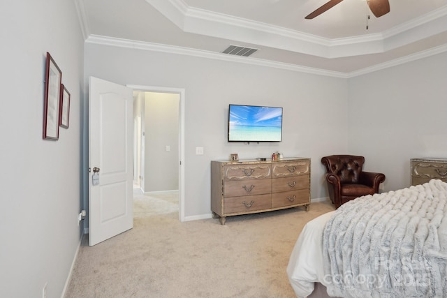 10401 Royal Winchester Dr, Charlotte, NC 28277 - bedroom featuring a raised ceiling, crown molding, light carpet, baseboards, and ceiling fan