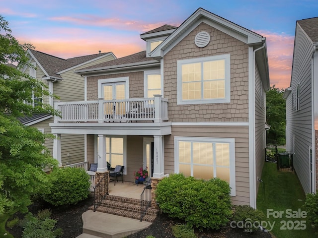 10401 Royal Winchester Dr, Charlotte, NC 28277 - back of property with a porch, a balcony, roof with shingles, and cooling unit