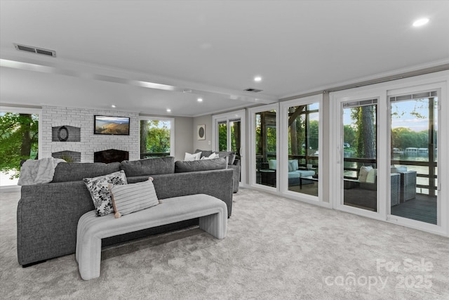 230 Shady Cove Rd, Troutman, NC 28166 - living room with carpet flooring, recessed lighting, a fireplace, and crown molding