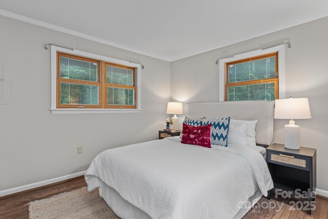 230 Shady Cove Rd, Troutman, NC 28166 - bedroom with wood finished floors, crown molding, and baseboards