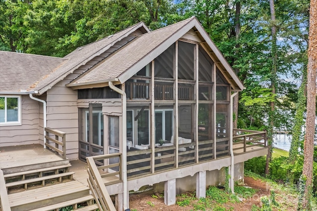 230 Shady Cove Rd, Troutman, NC 28166 - back of house with a sunroom, a shingled roof, and a deck