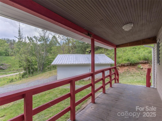 280 Noland Dr, Clyde, NC 28721 - wooden terrace with a wooded view