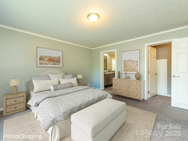 11 Bartlett Ave, Black Mountain, NC 28711 - carpeted bedroom featuring ornamental molding, a textured ceiling, and ensuite bath