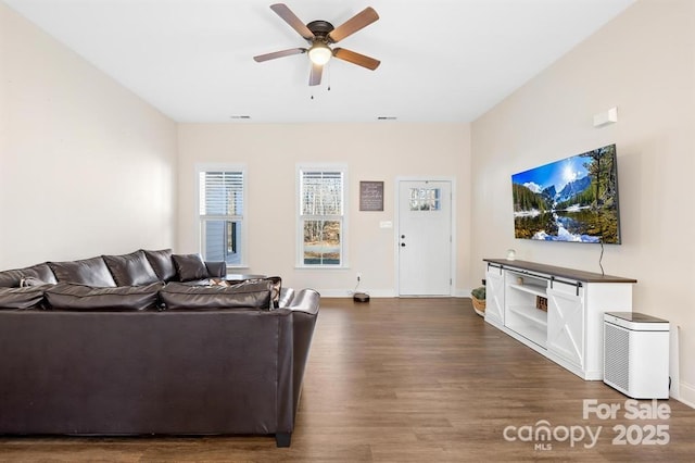 242 Delview Dr, Cherryville, NC 28021 - living room with dark wood-style floors, a ceiling fan, and baseboards