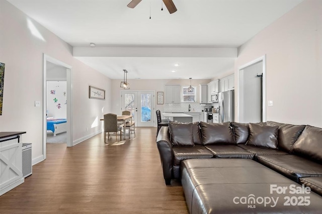 242 Delview Dr, Cherryville, NC 28021 - living area featuring wood finished floors, a ceiling fan, and baseboards