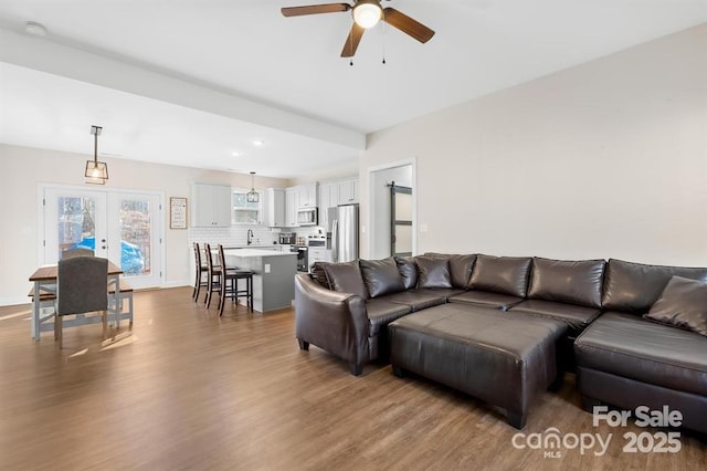 242 Delview Dr, Cherryville, NC 28021 - living room featuring french doors, a ceiling fan, wood finished floors, and recessed lighting