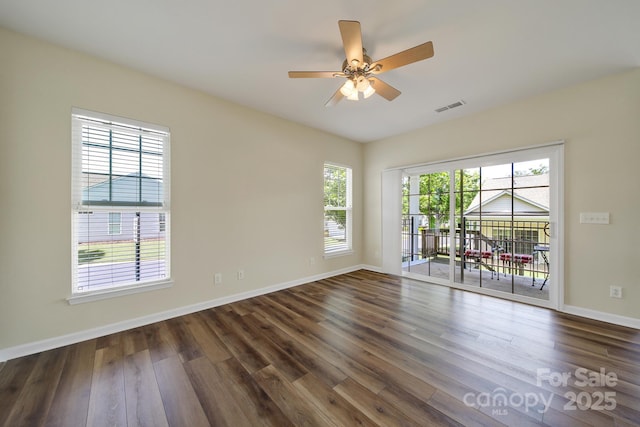 28129 Song Sparrow Ln, Fort Mill, SC 29707 - unfurnished room featuring dark wood-style flooring, ceiling fan, and baseboards