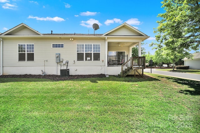28129 Song Sparrow Ln, Fort Mill, SC 29707 - rear view of house featuring a yard, covered porch, and central AC