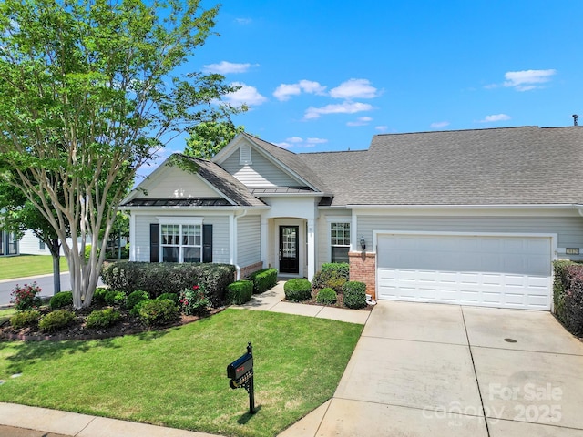 28129 Song Sparrow Ln, Fort Mill, SC 29707 - view of front of property with concrete driveway, a garage, a front yard, and brick siding