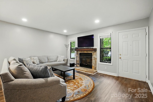 392 Tall Oaks Trl, Fort Mill, SC 29715 - living room with dark wood finished floors, healthy amount of natural light, a fireplace, baseboards, and recessed lighting